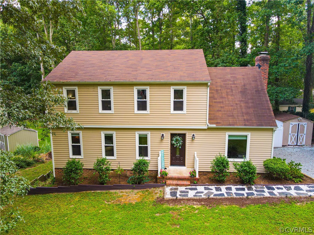 12935 Ashtree Road Midlothian, VA 23114 - Photo 3 of 50 front view of a house with a yard