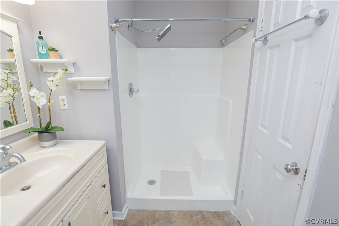 12935 Ashtree Road Midlothian, VA 23114 - Photo 34 of 50 a bathroom with a sink and a mirror