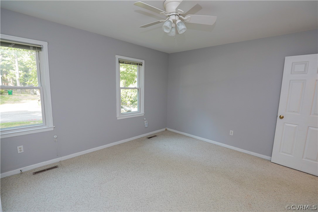 12935 Ashtree Road Midlothian, VA 23114 - Photo 39 of 50 an empty room with a window