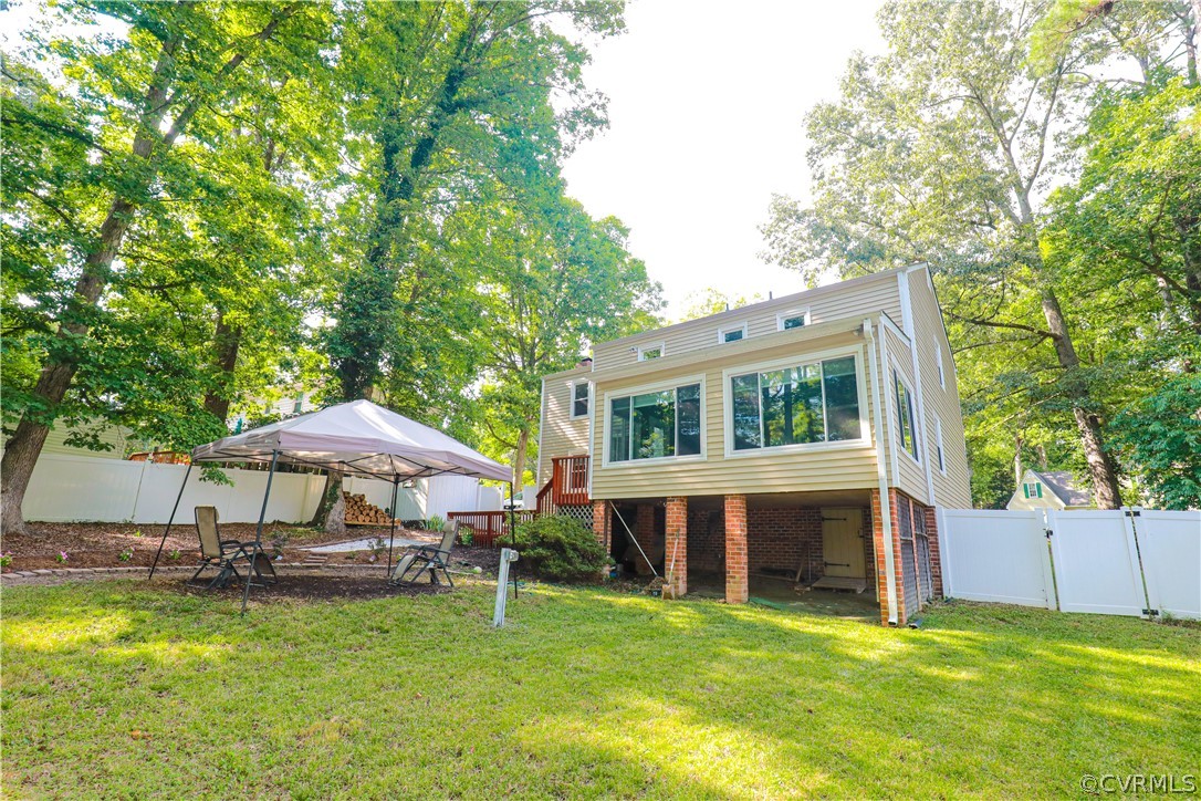 12935 Ashtree Road Midlothian, VA 23114 - Photo 44 of 50 a view of a house with a yard porch and sitting area