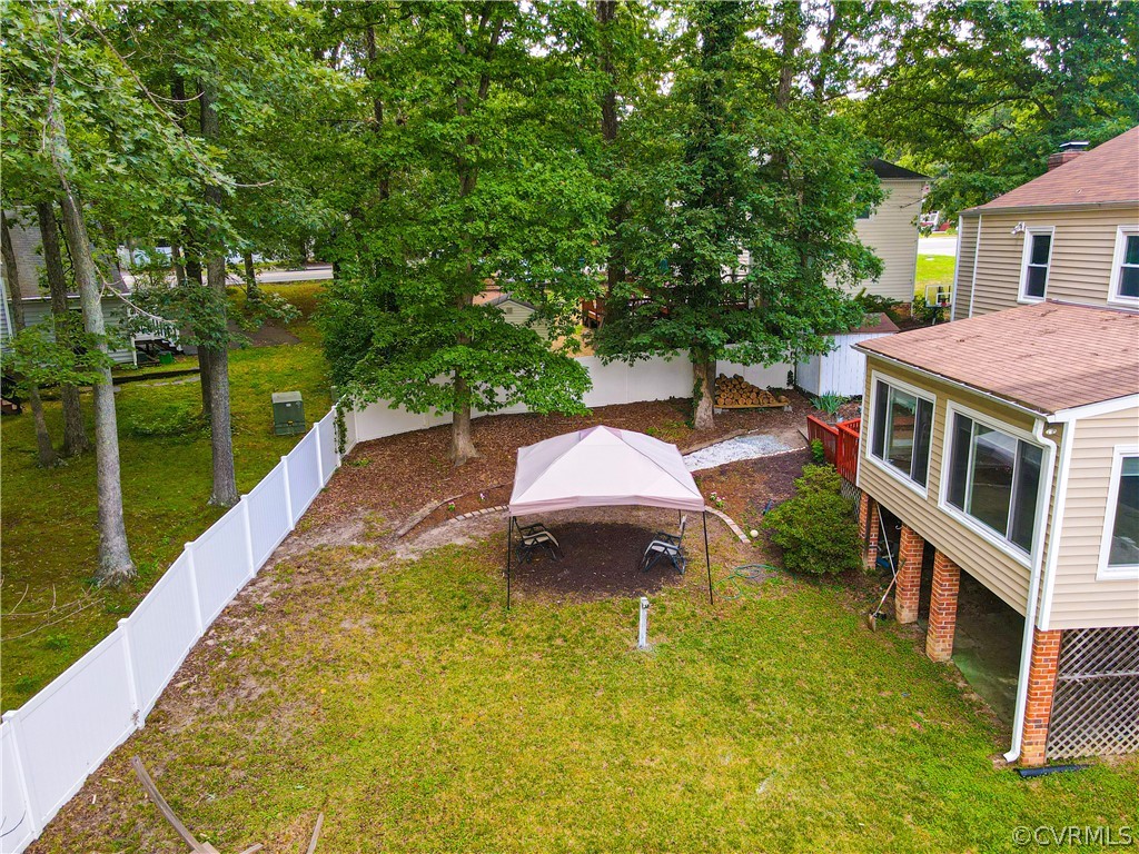 12935 Ashtree Road Midlothian, VA 23114 - Photo 46 of 50 a aerial view of a house with swimming pool and large trees