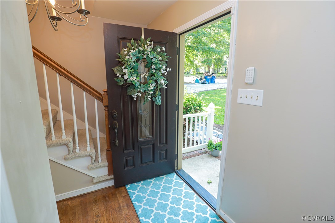 12935 Ashtree Road Midlothian, VA 23114 - Photo 6 of 50 a view of entryway with wooden floor and a livingroom