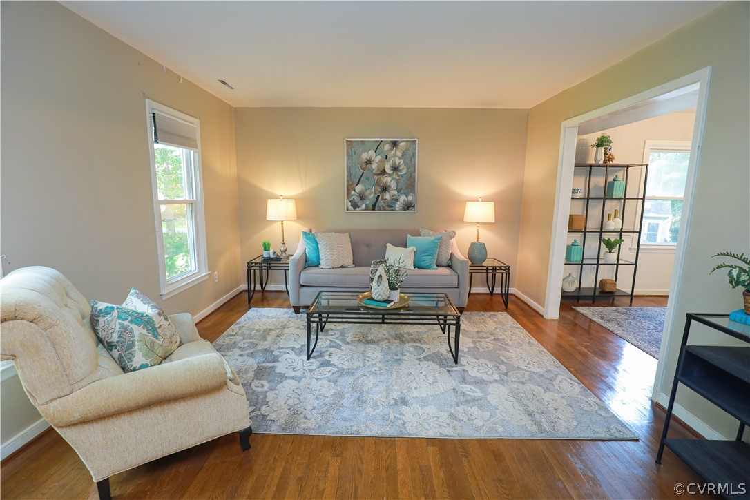 12935 Ashtree Road Midlothian, VA 23114 - Photo 7 of 50 a living room with furniture and a rug