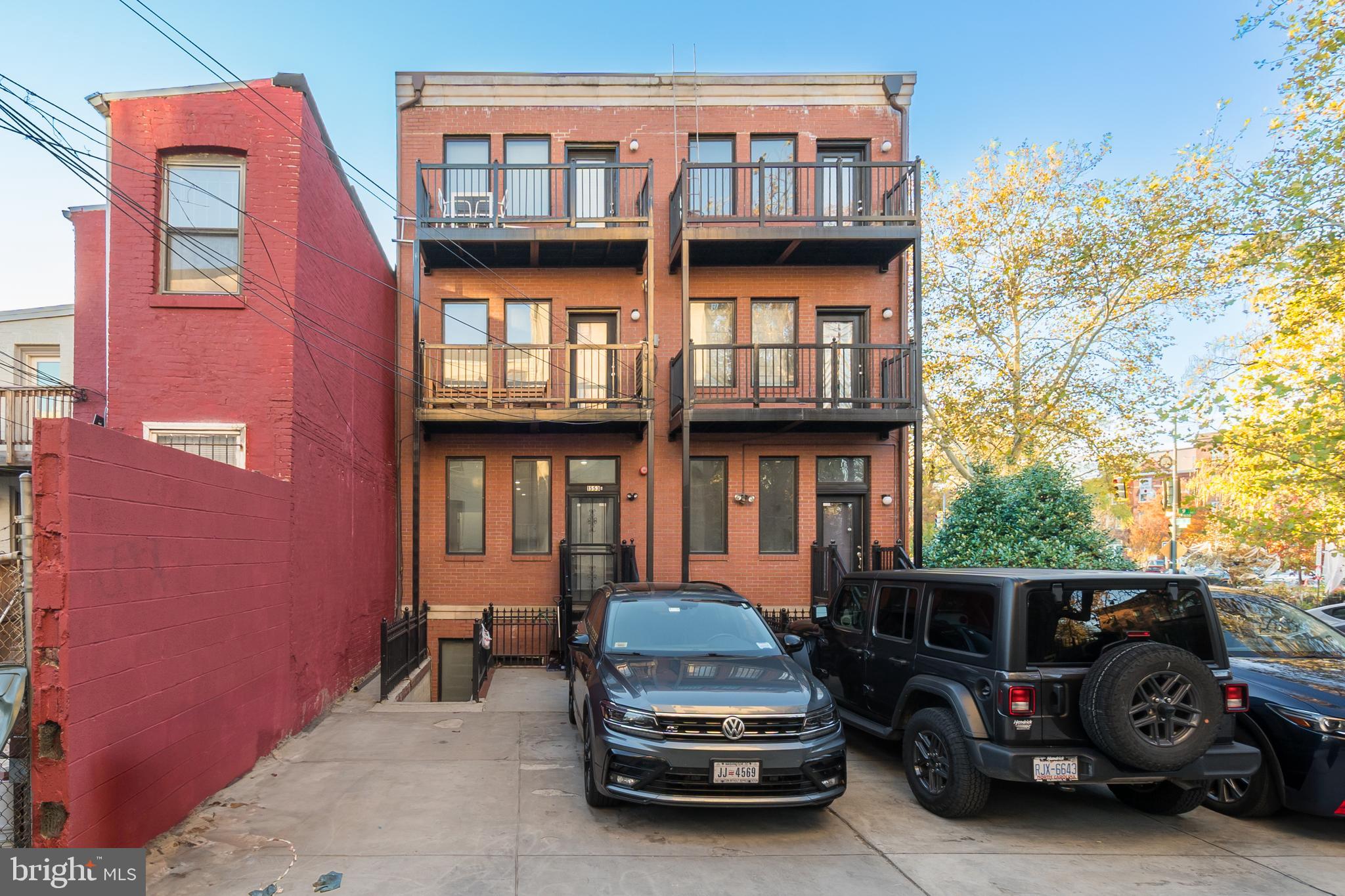 1553 9th Street Northwest, Unit A Washington, DC 20001 - Photo 2 of 30 a car parked in front of a building
