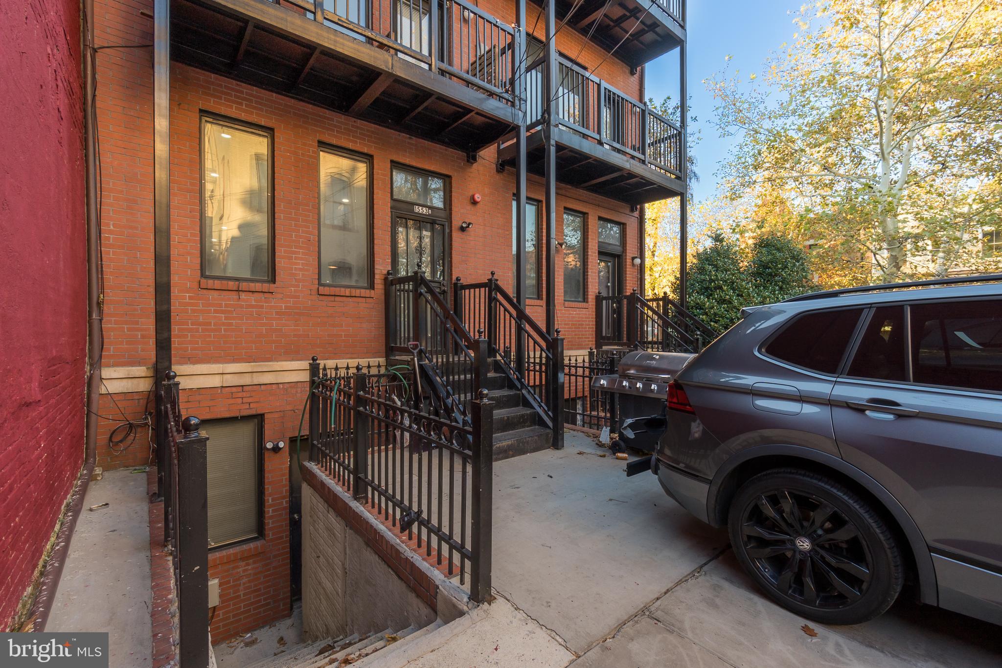 1553 9th Street Northwest, Unit A Washington, DC 20001 - Photo 24 of 30 a view of a car park in front of house