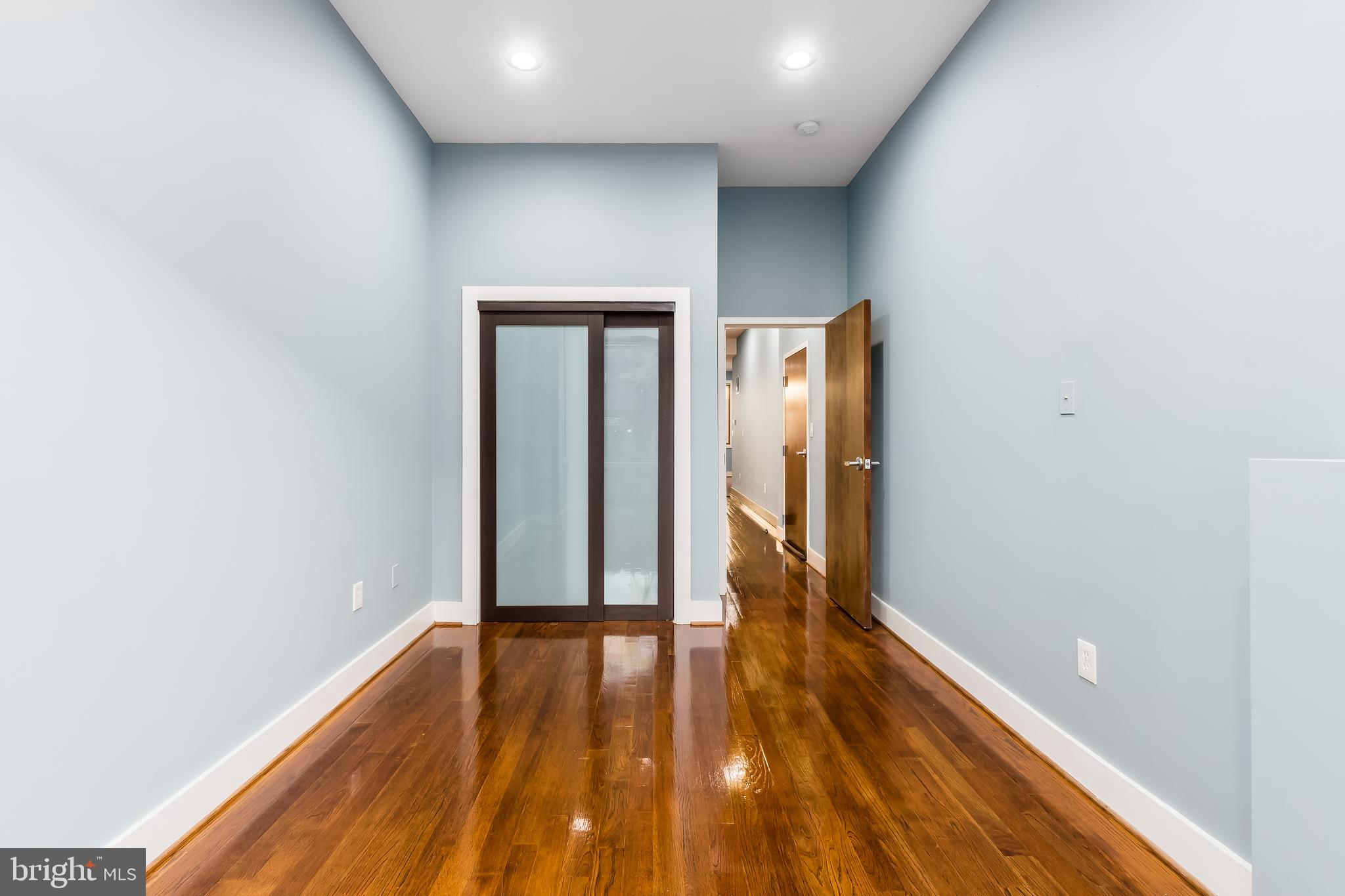 1553 9th Street Northwest, Unit A Washington, DC 20001 - Photo 8 of 30 a view of hallway with wooden floor