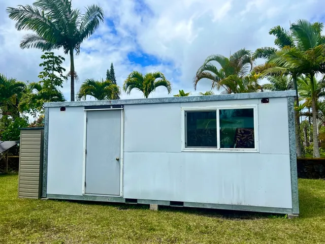 a view of front door and yard