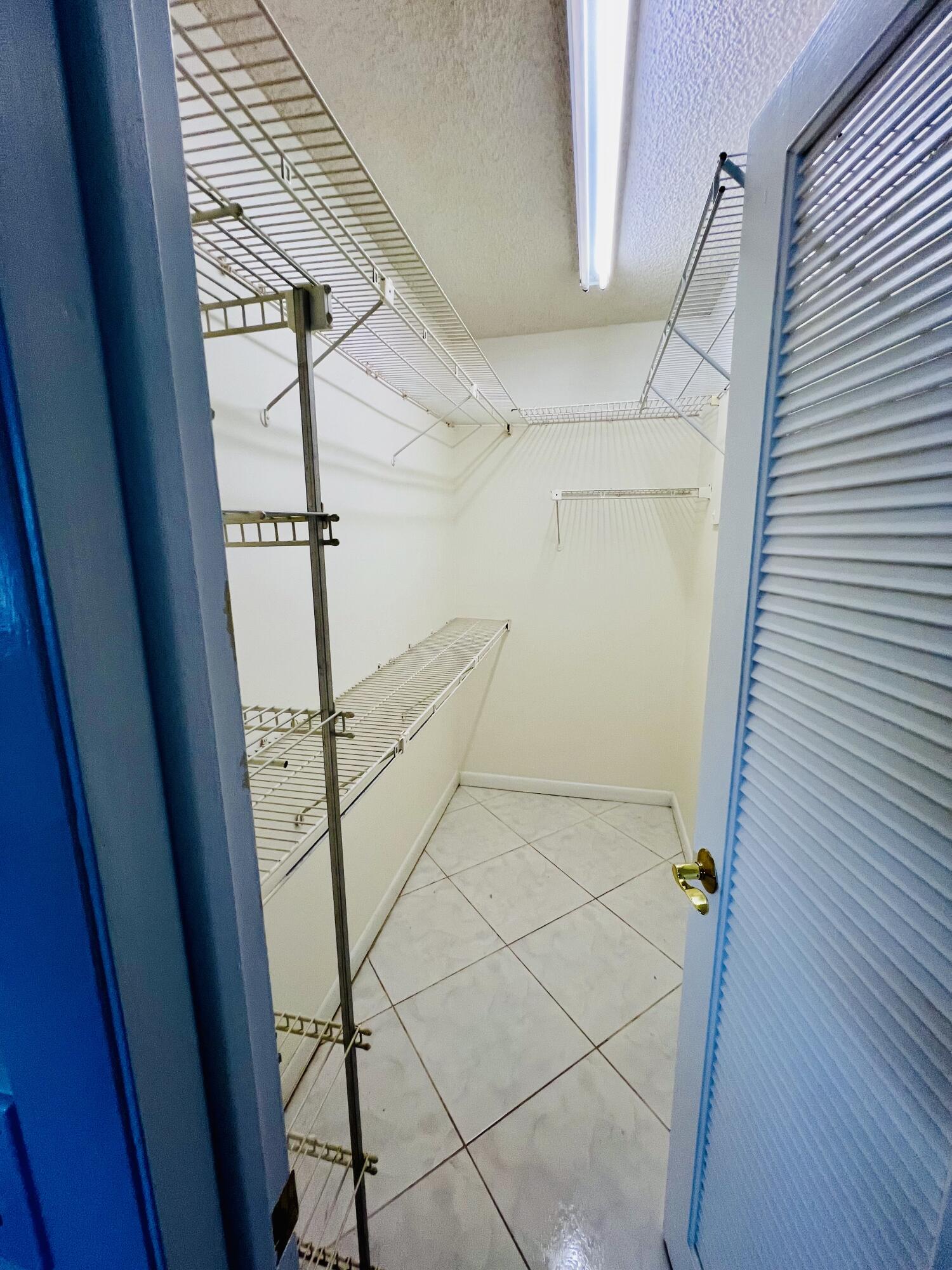 60 Normandy B Delray Beach, FL 33484 - Photo 11 of 48 Master Bedroom Closet