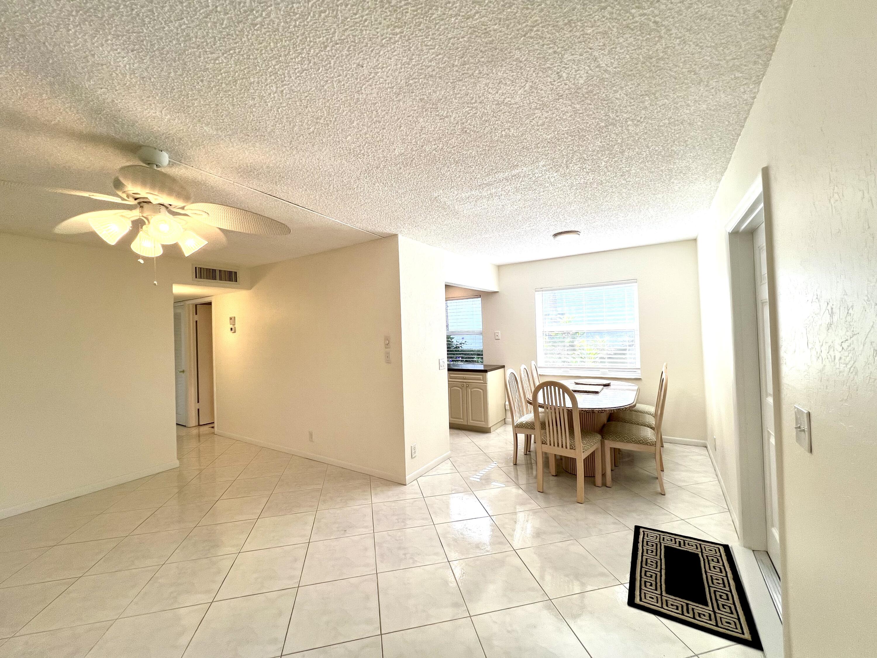 60 Normandy B Delray Beach, FL 33484 - Photo 2 of 48 Dining & Living Room