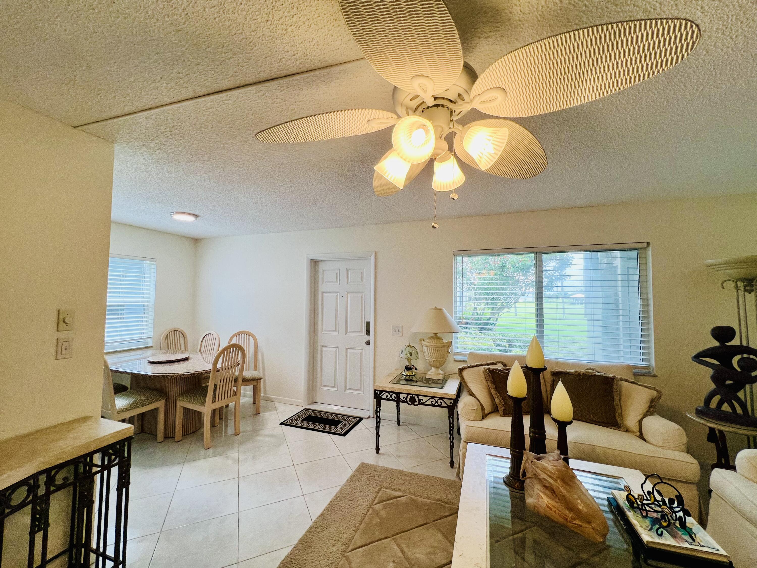 60 Normandy B Delray Beach, FL 33484 - Photo 3 of 48 Dining Room & Living Room