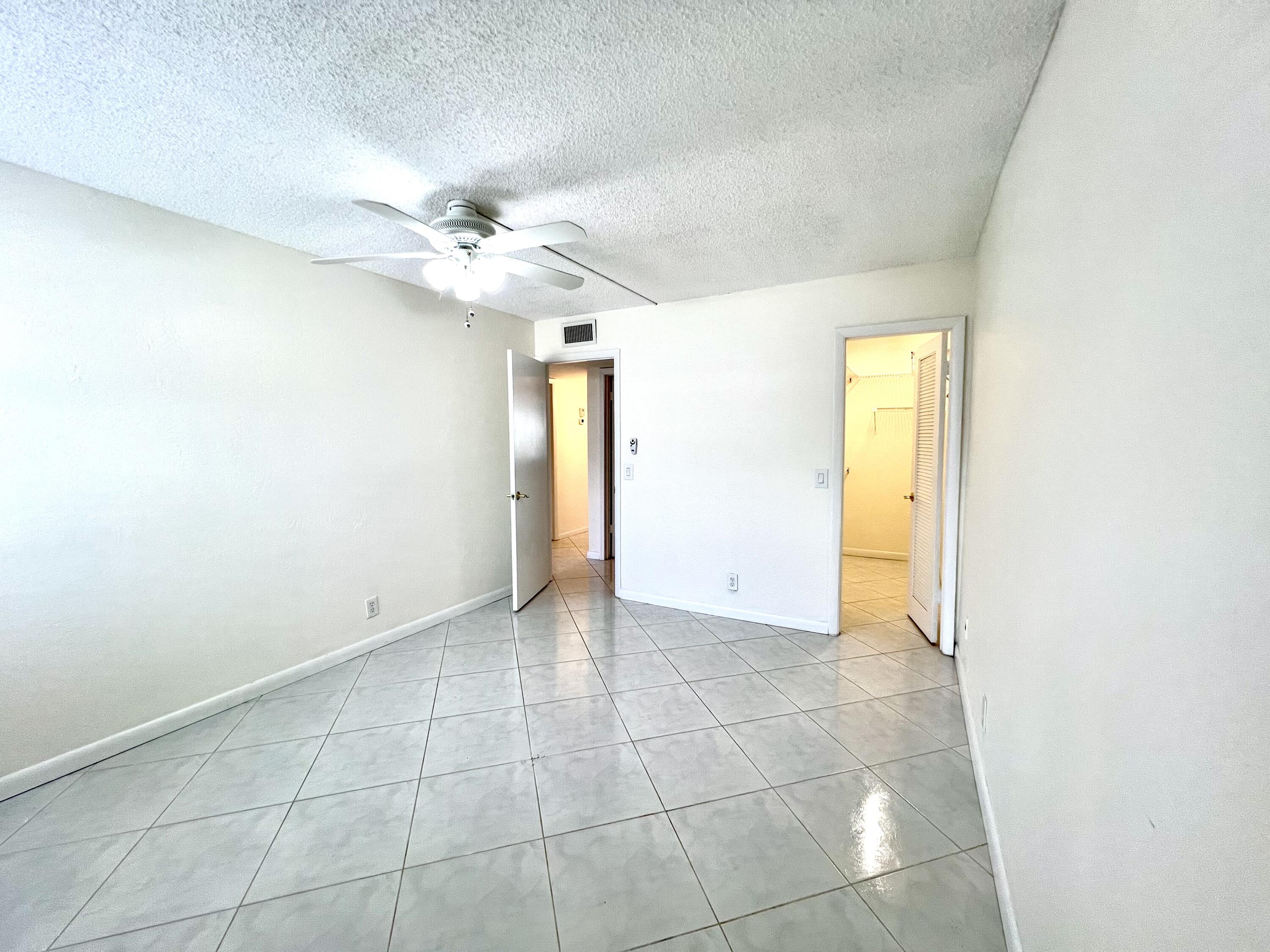 60 Normandy B Delray Beach, FL 33484 - Photo 10 of 48 Master Bedroom