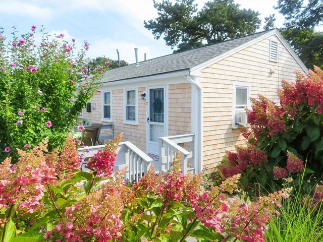 a view of a house with a street