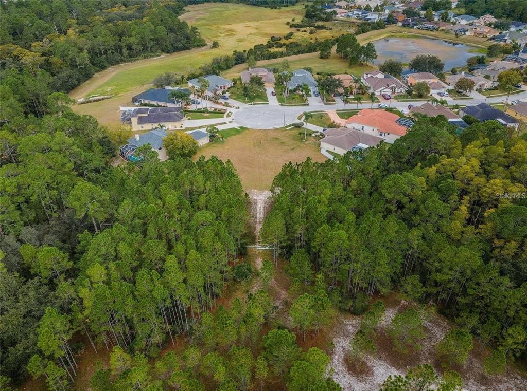0 Shooting Star Court New Port Richey, FL 34655 - Photo 16 of 23 a view of a lake with outdoor space