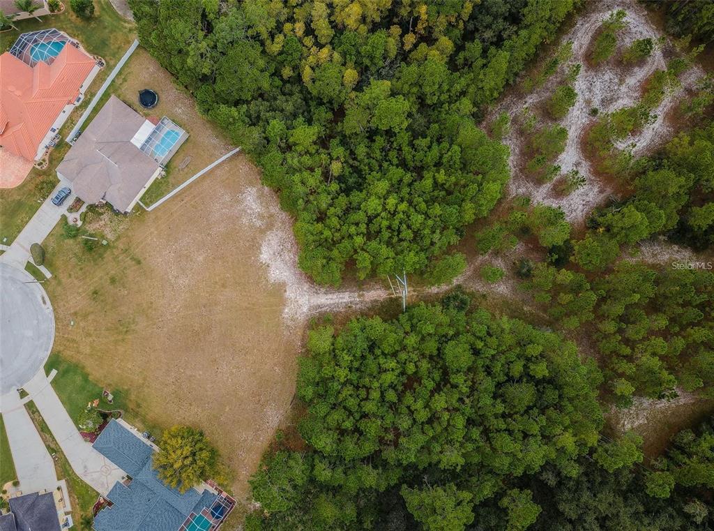 0 Shooting Star Court New Port Richey, FL 34655 - Photo 17 of 23 an aerial view of a house with a yard