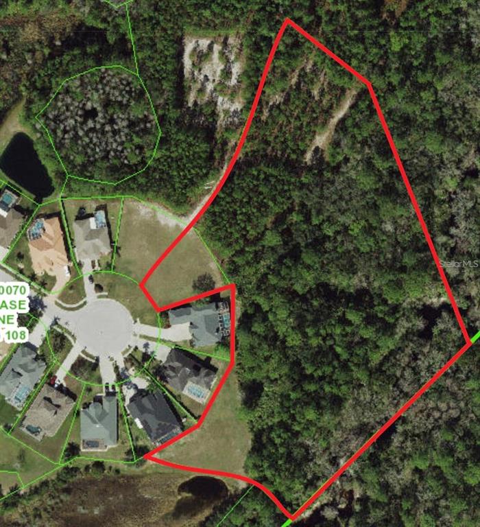 0 Shooting Star Court New Port Richey, FL 34655 - Photo 2 of 23 an aerial view of a tennis court