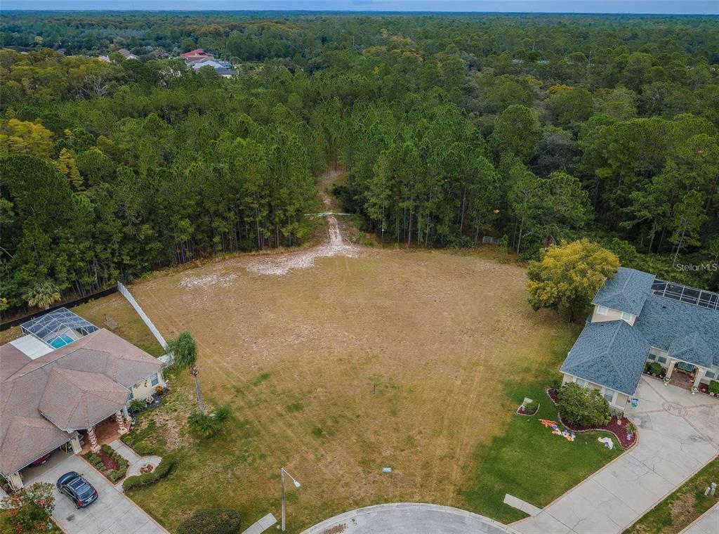 0 Shooting Star Court New Port Richey, FL 34655 - Photo 8 of 23 an aerial view of a house with a yard