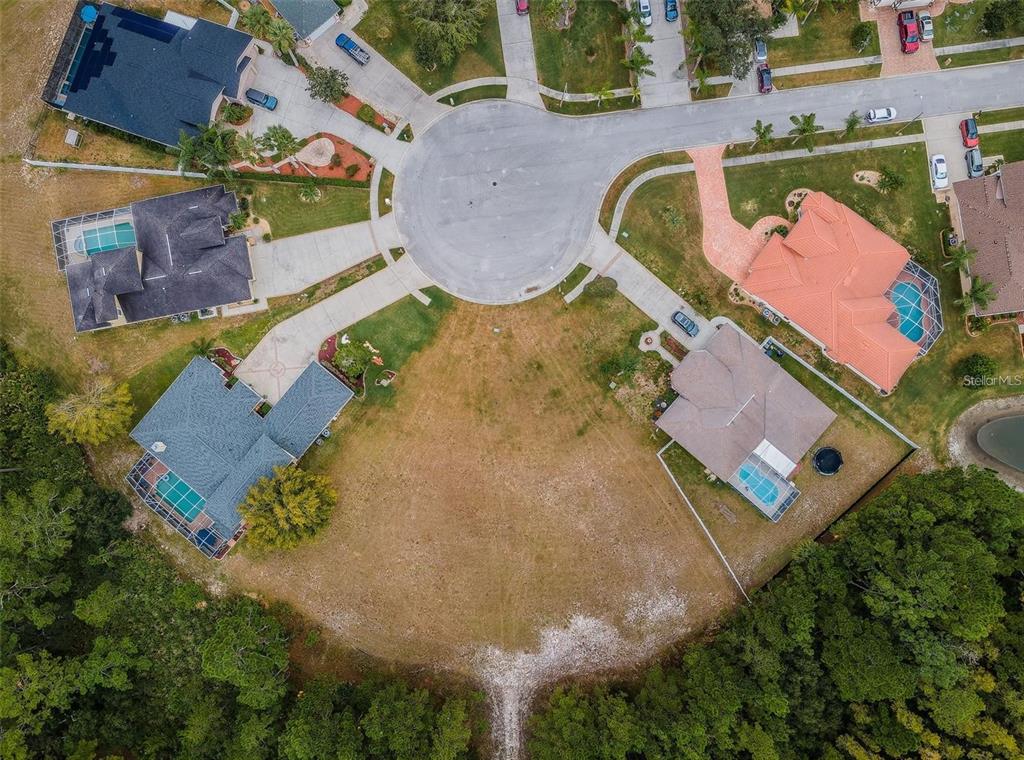 0 Shooting Star Court New Port Richey, FL 34655 - Photo 10 of 23 an aerial view of a house with a swimming pool