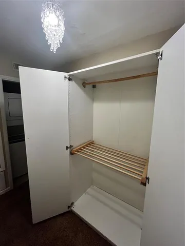 a view of hallway with washer and dryer