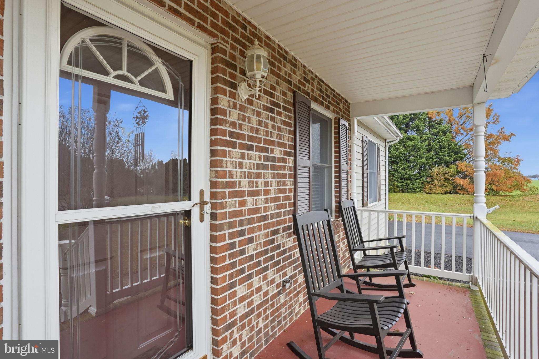 251 Misty Ridge Drive Magnolia, DE 19962 - Photo 2 of 33 a view of a balcony with chairs
