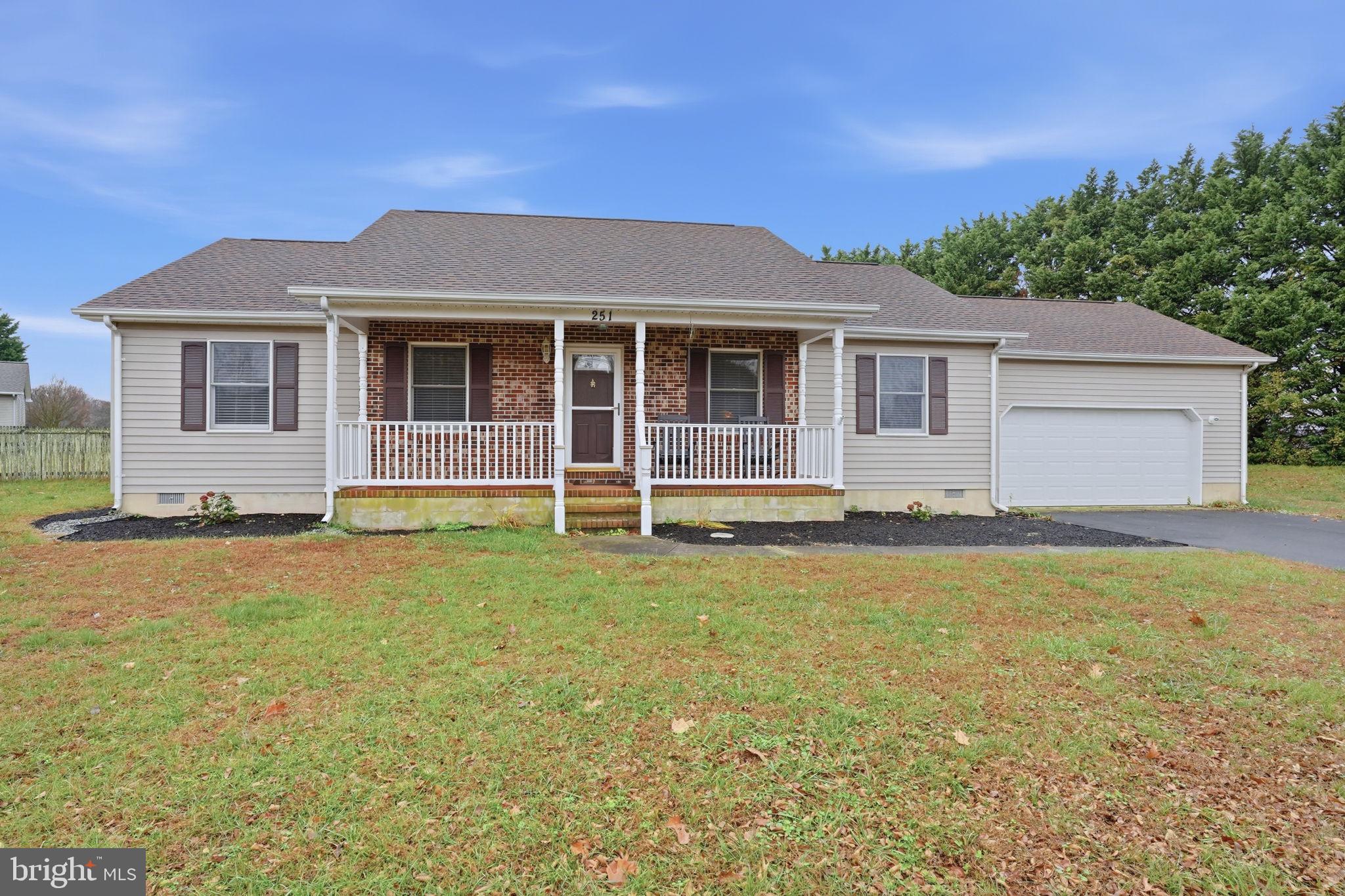 251 Misty Ridge Drive Magnolia, DE 19962 - Photo 30 of 33 front view of a house with a yard
