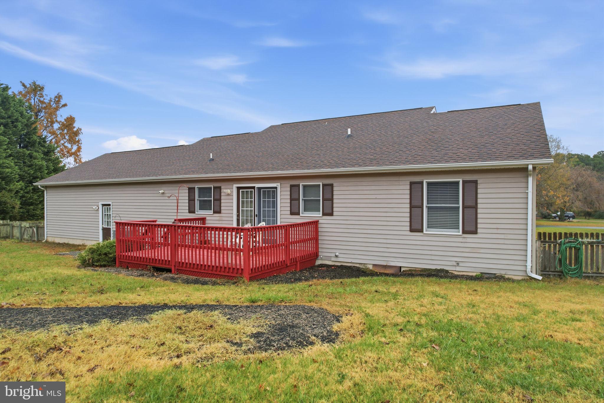 251 Misty Ridge Drive Magnolia, DE 19962 - Photo 32 of 33 a front view of a house with a yard