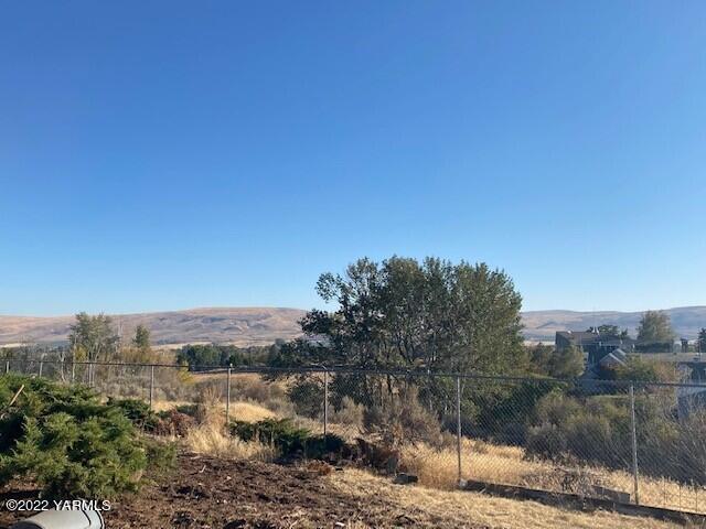 2807 Nelson Road Yakima, WA 98903 - Photo 11 of 11 a view of a lake with a mountain in the background