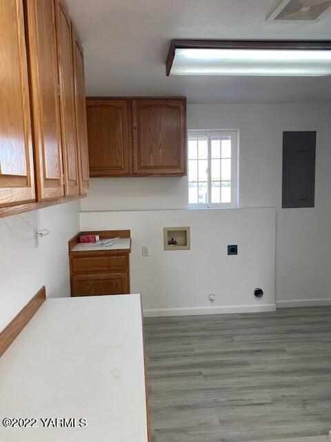 2807 Nelson Road Yakima, WA 98903 - Photo 8 of 11 a kitchen with stainless steel appliances granite countertop a stove a sink and a microwave