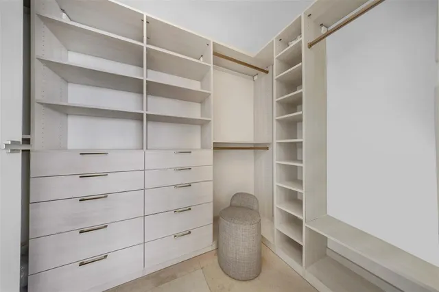 a bathroom with a sink and a large mirror