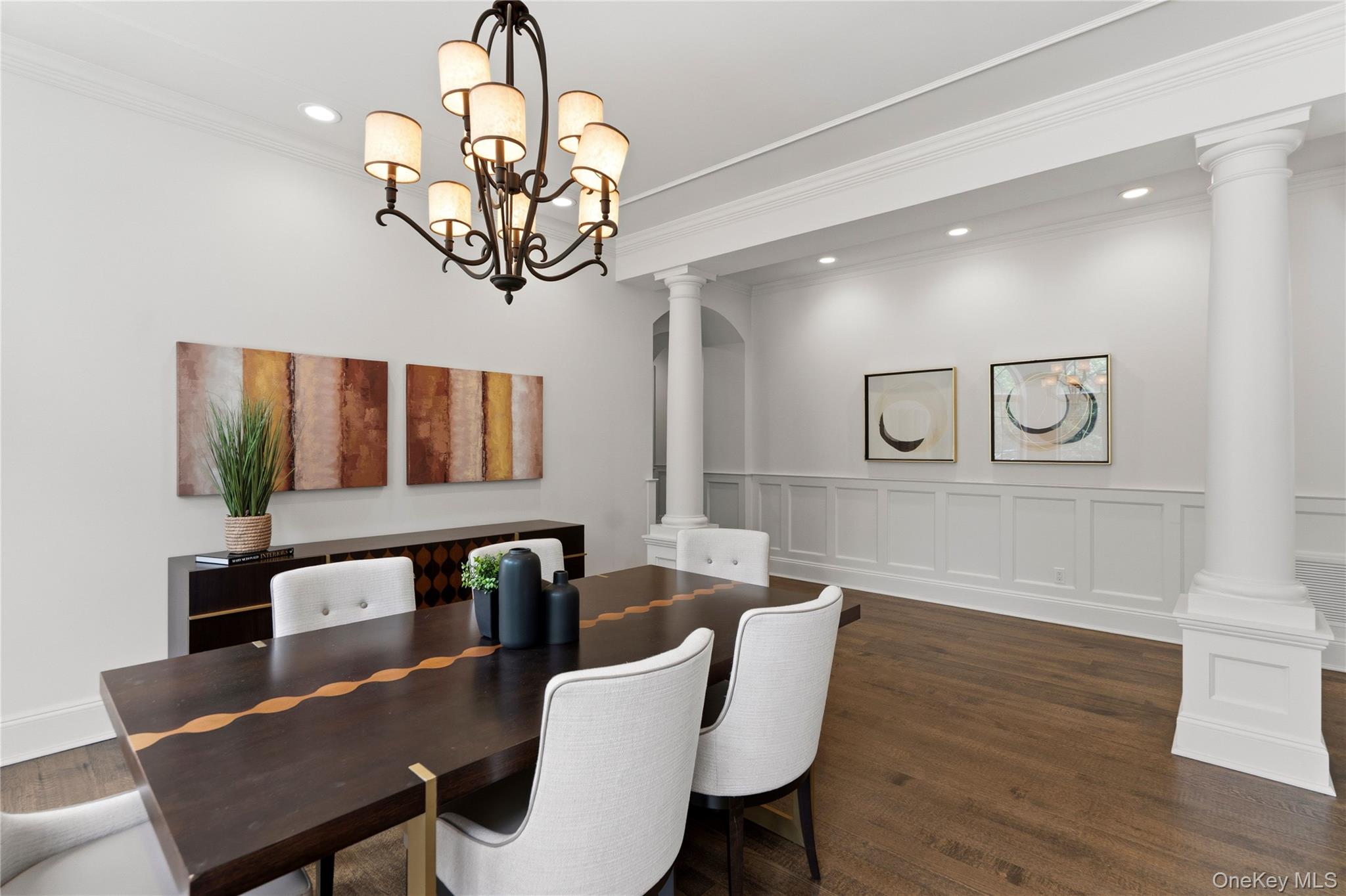 1960 Midlane Road South Syosset, NY 11791 - Photo 12 of 46 a view of a dining room with furniture a chandelier and wooden floor
