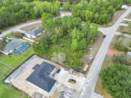 a view of yard with patio