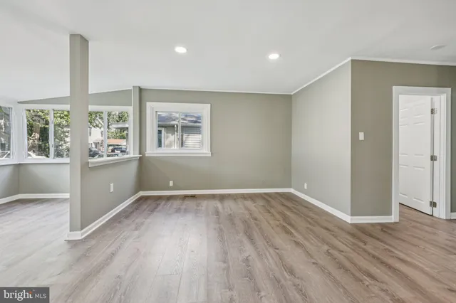 an empty room with windows