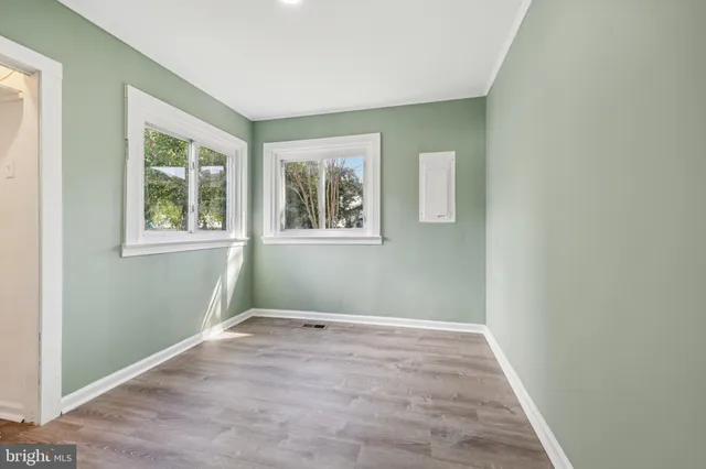 a view of entryway with wooden floor