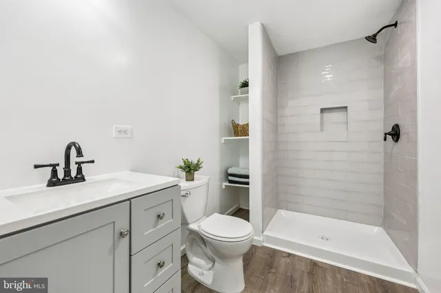 a bathroom with a sink and a shower