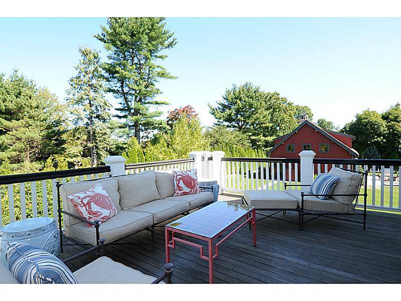 581 Sasco Hill Road Fairfield, CT 06824 - Photo 14 of 25 a balcony with wooden floor and outdoor seating