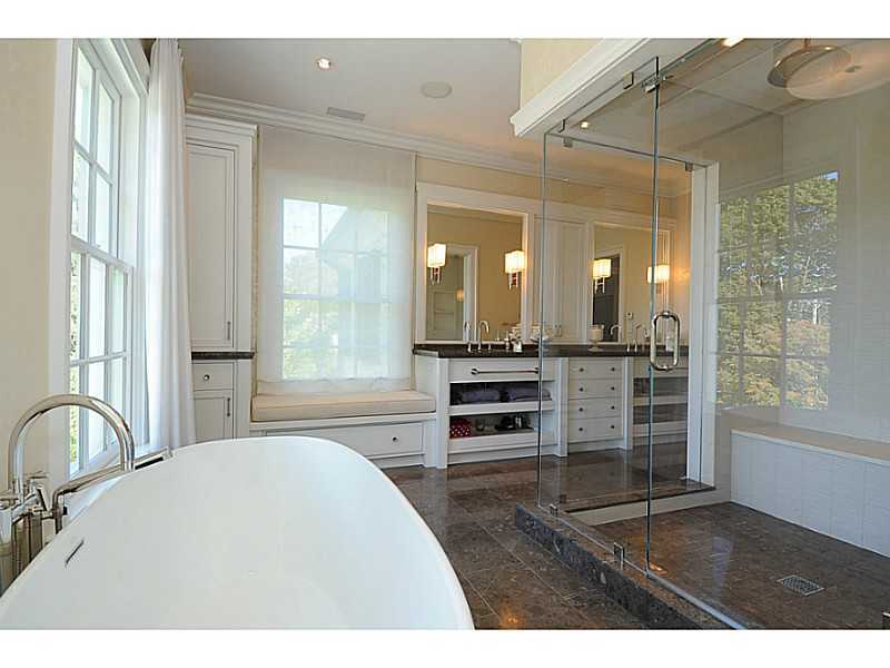 581 Sasco Hill Road Fairfield, CT 06824 - Photo 15 of 25 a kitchen with stainless steel appliances a refrigerator and a sink