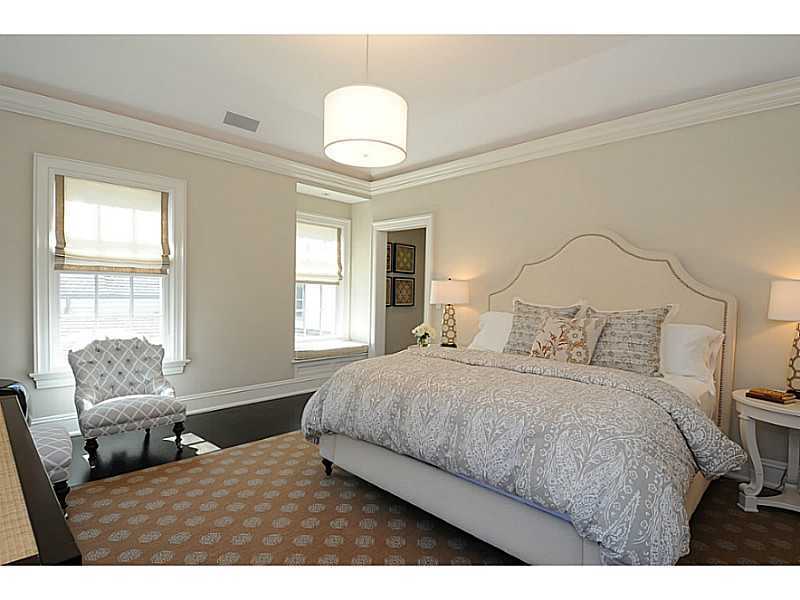 581 Sasco Hill Road Fairfield, CT 06824 - Photo 17 of 25 a bedroom with a bed and window