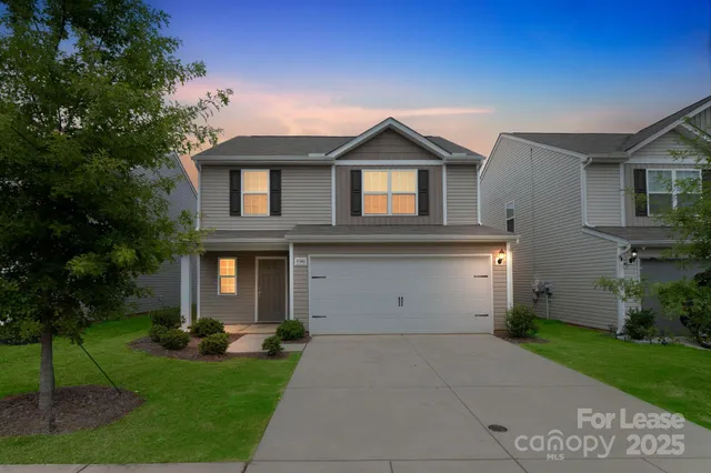 a front view of house with yard