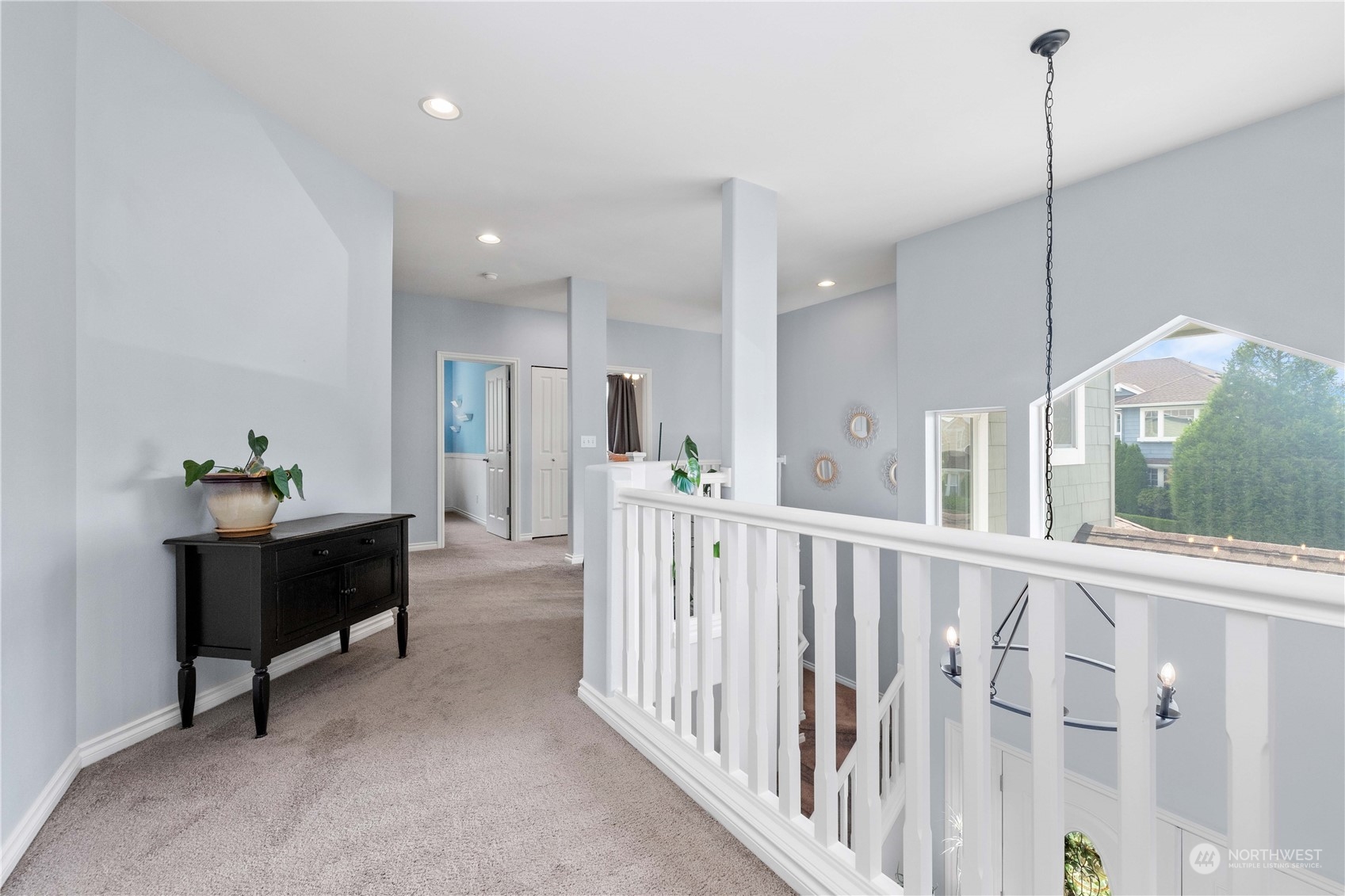 27648 Maple Ridge Way Southeast Maple Valley, WA 98038 - Photo 17 of 40 a view of a hallway with furniture and windows