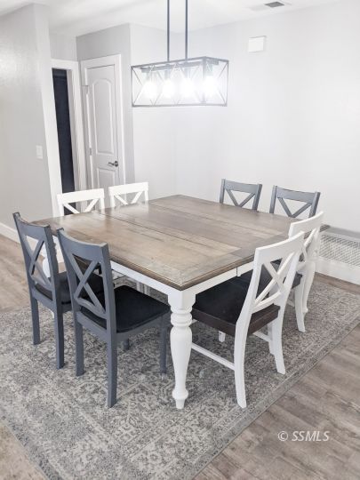 237 West Rader Avenue Ridgecrest, CA 93555 - Photo 11 of 37 a view of a dining room and chandelier