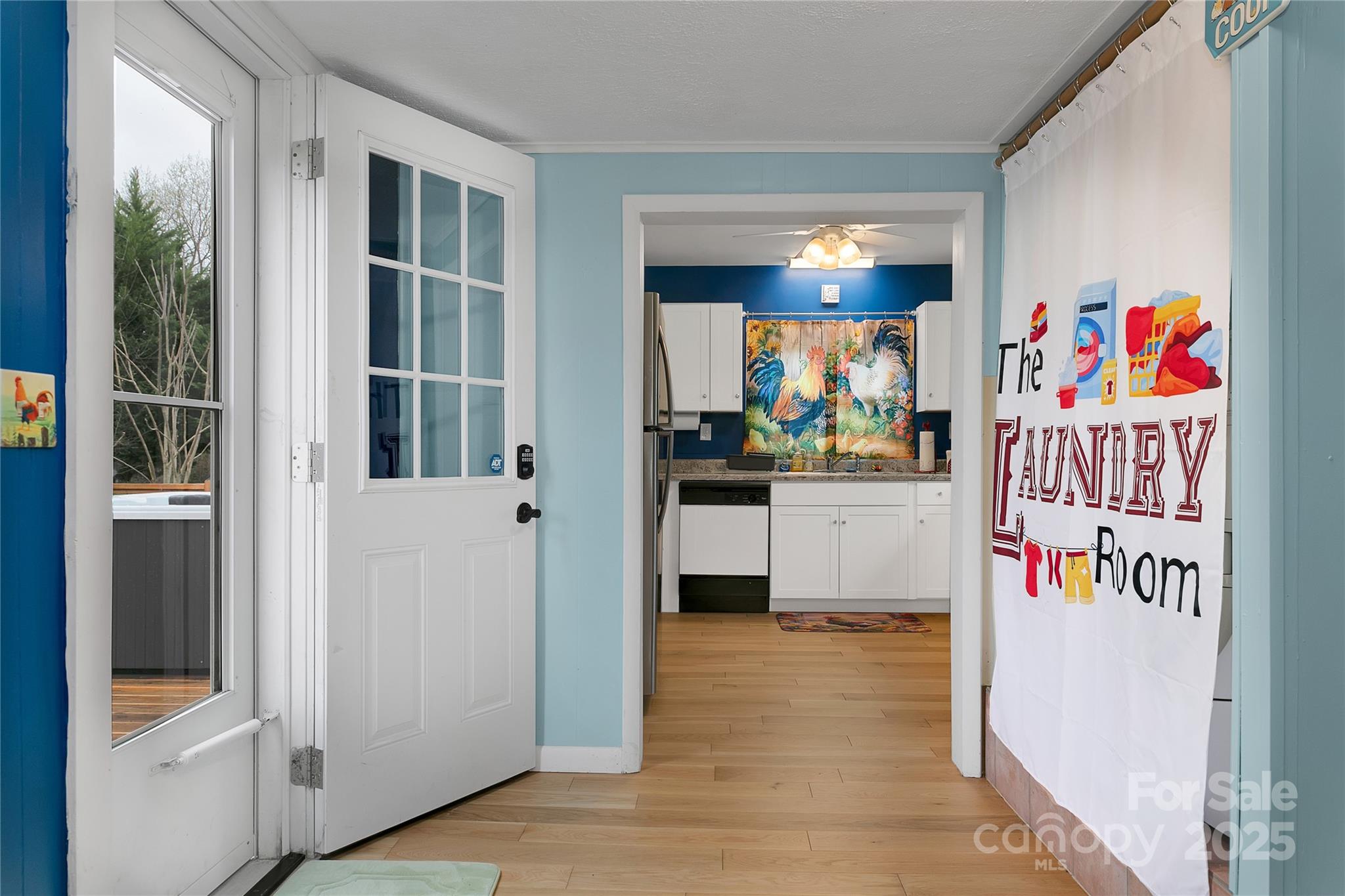 626 Fairview Loop Hot Springs, NC 28743 - Photo 14 of 44 a storage room with washer and dryer