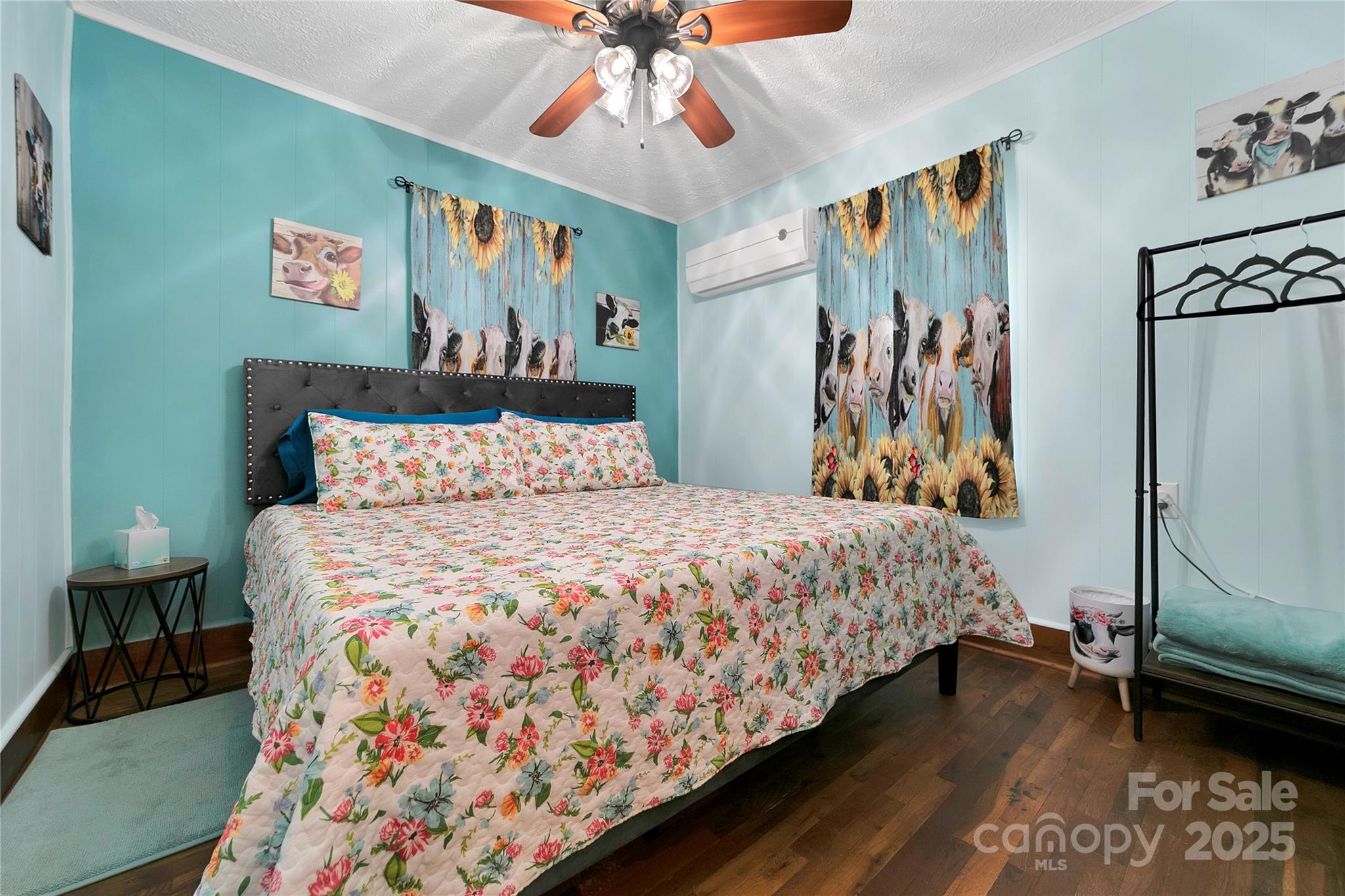 626 Fairview Loop Hot Springs, NC 28743 - Photo 24 of 44 a bedroom with a bed and a chandelier