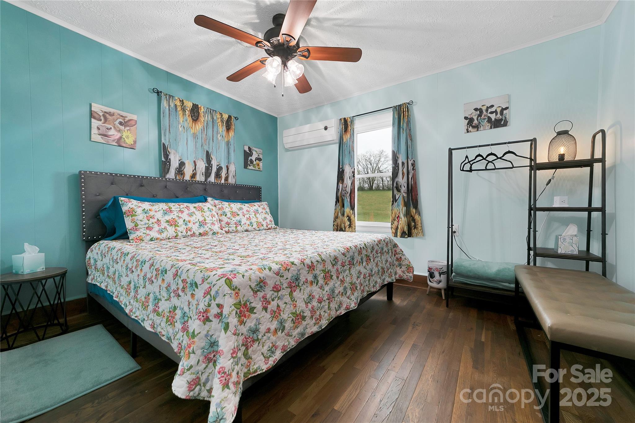 626 Fairview Loop Hot Springs, NC 28743 - Photo 26 of 44 a bed sitting in a bedroom next to a window