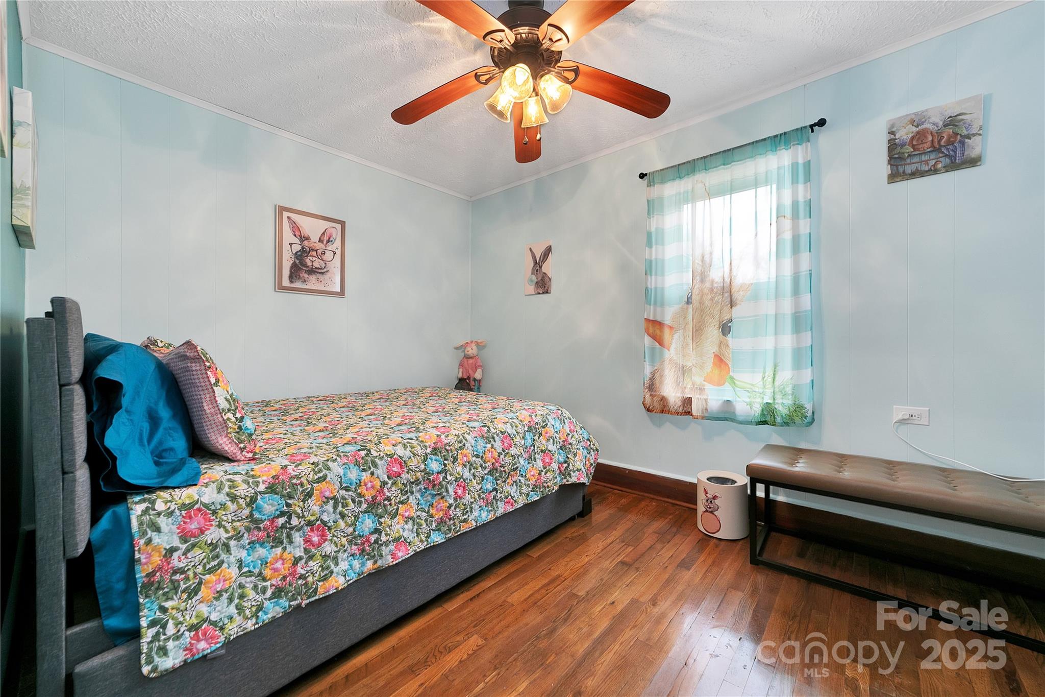 626 Fairview Loop Hot Springs, NC 28743 - Photo 32 of 44 a bedroom with a bed and a chandelier