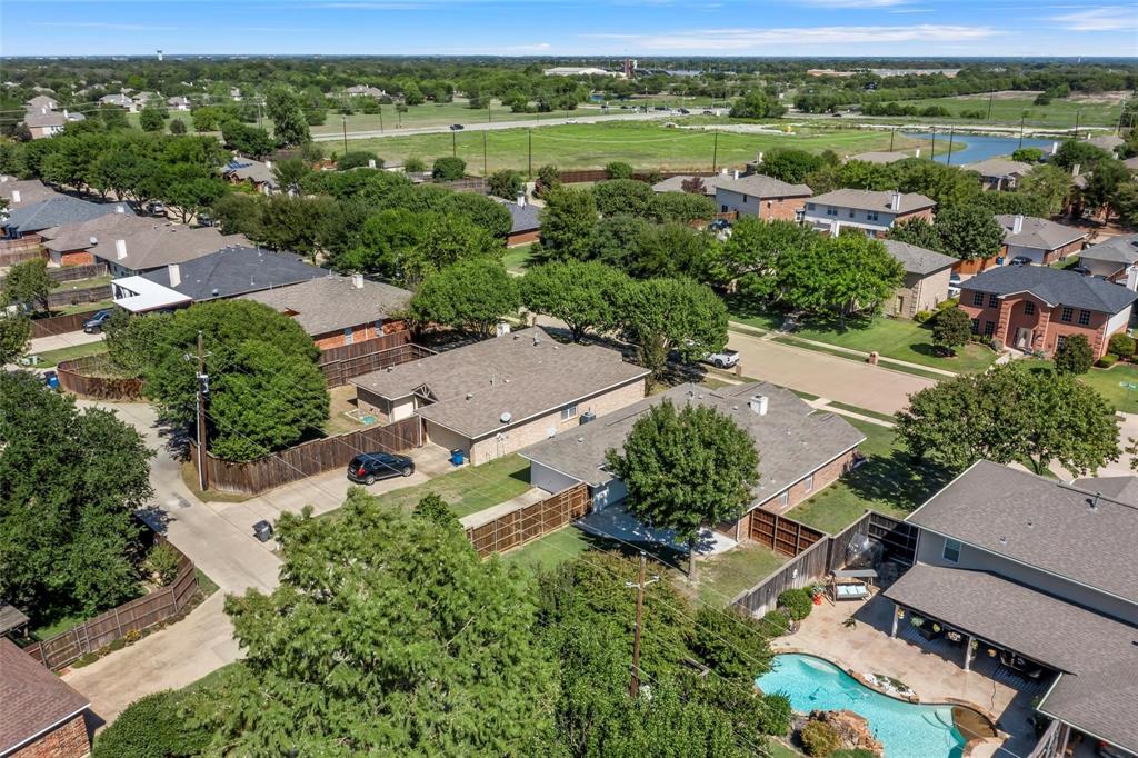 204 Arbor Ridge Drive Allen, TX 75002 - Photo 33 of 36 Aerial perspective showcasing a residential neighborhood with varied architectural styles and mature trees