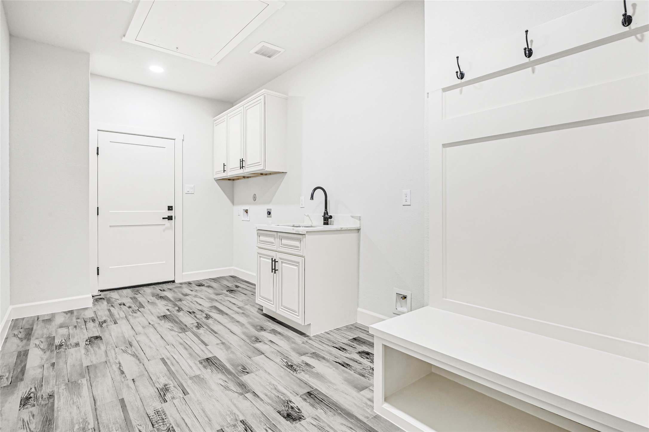 104 Inscription Lane Huntsville, TX 77340 - Photo 20 of 39 Laundry room with sink and tons of room