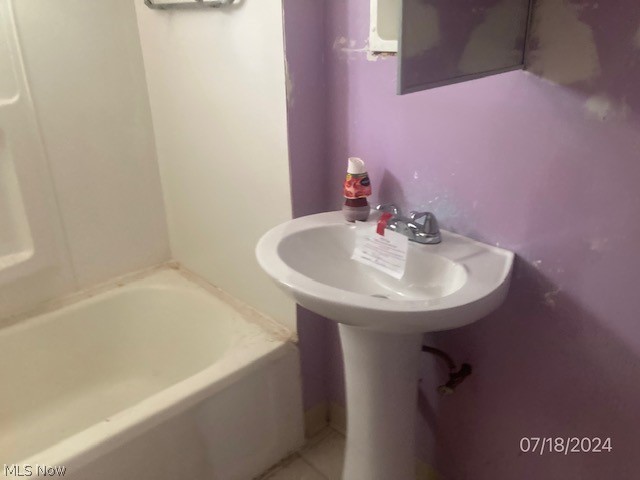 1509 South Noble Road Cleveland, OH 44121 - Photo 7 of 11 Bathroom with tile patterned flooring