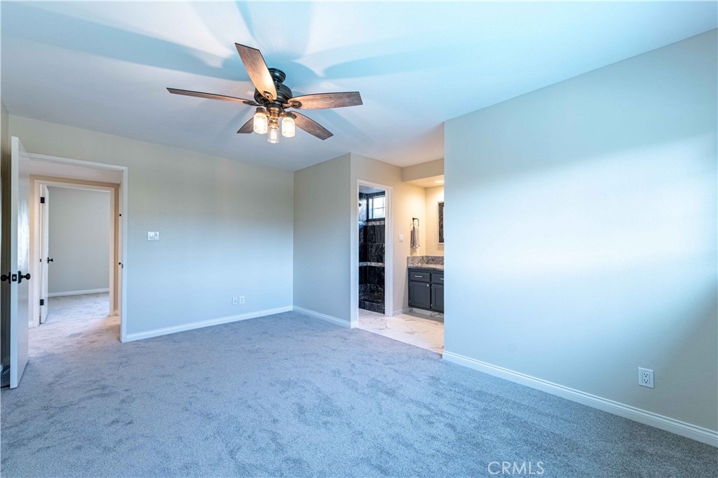 2232 Hawk Street Simi Valley, CA 93065 - Photo 18 of 39 an empty room with closet and a ceiling fan
