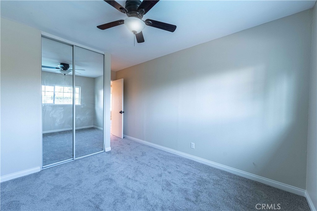 2232 Hawk Street Simi Valley, CA 93065 - Photo 24 of 39 an empty room with closet and windows