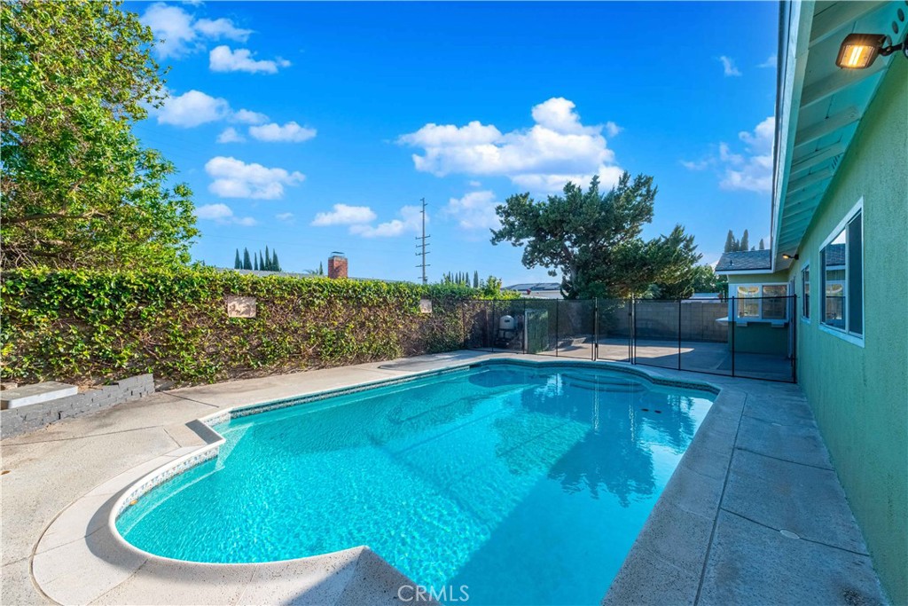 2232 Hawk Street Simi Valley, CA 93065 - Photo 31 of 39 a view of a swimming pool with a patio