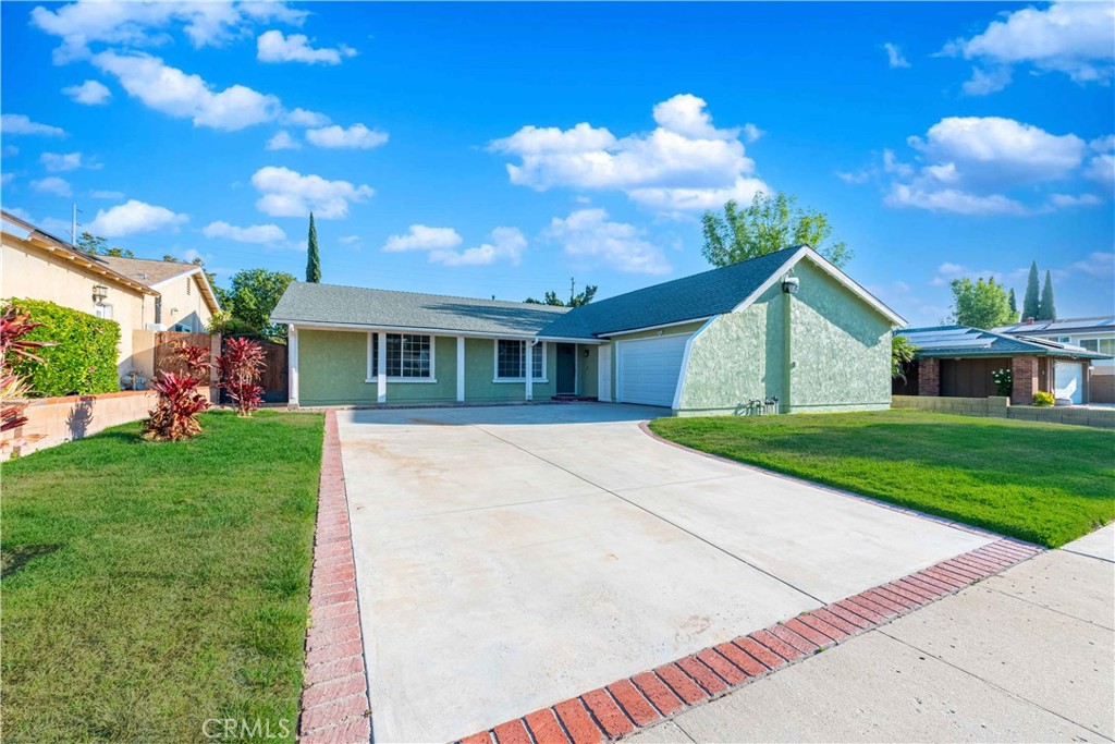 2232 Hawk Street Simi Valley, CA 93065 - Photo 38 of 39 a front view of house with yard and green space